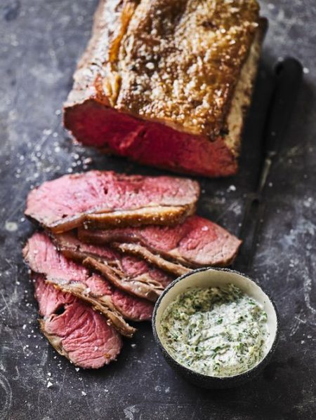 Spit-roast sirloin with green thursday inspired sauce